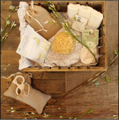 a basket filled with soap and sponges