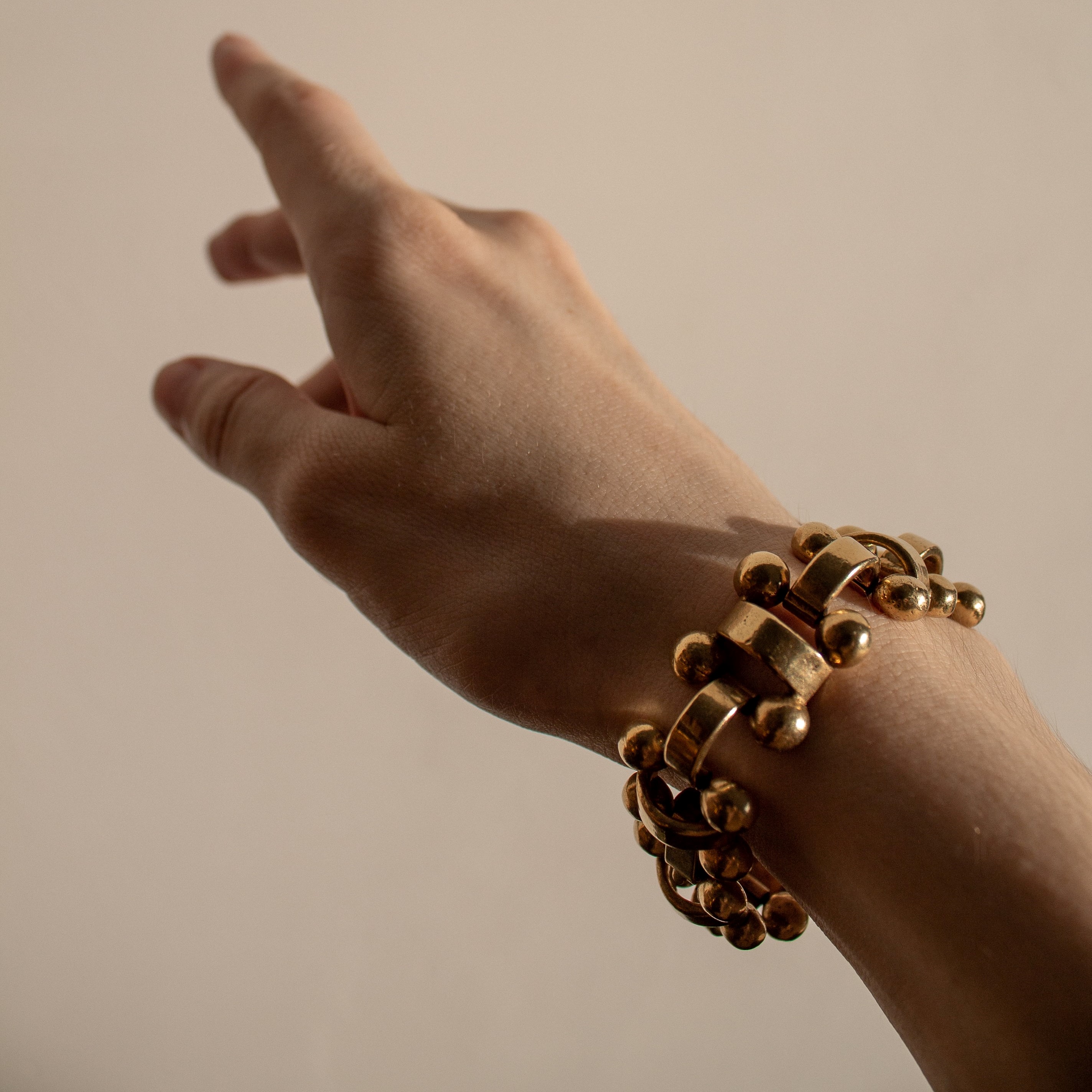 A thick, gold bracelet