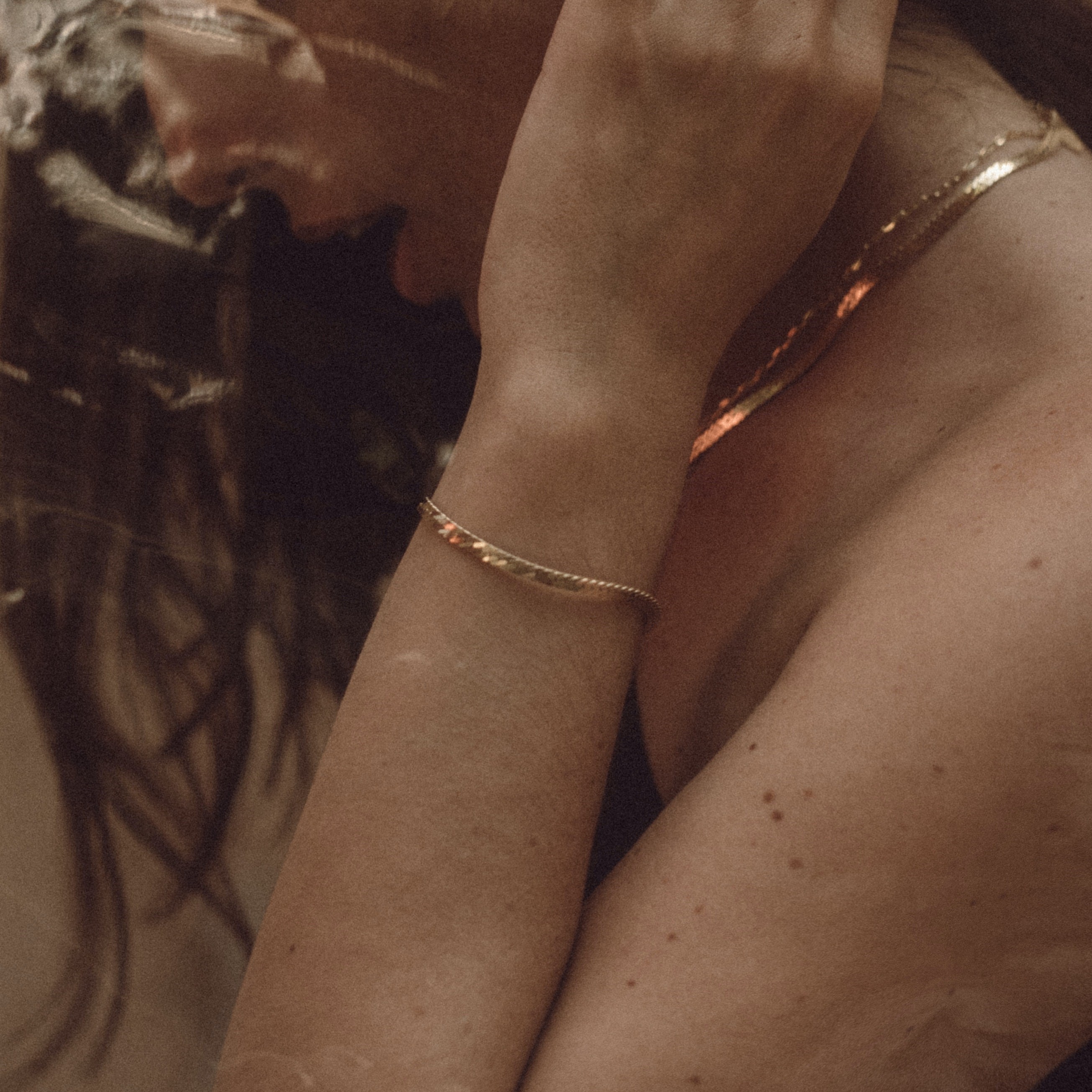 A minimalistic gold bracelet with no charms