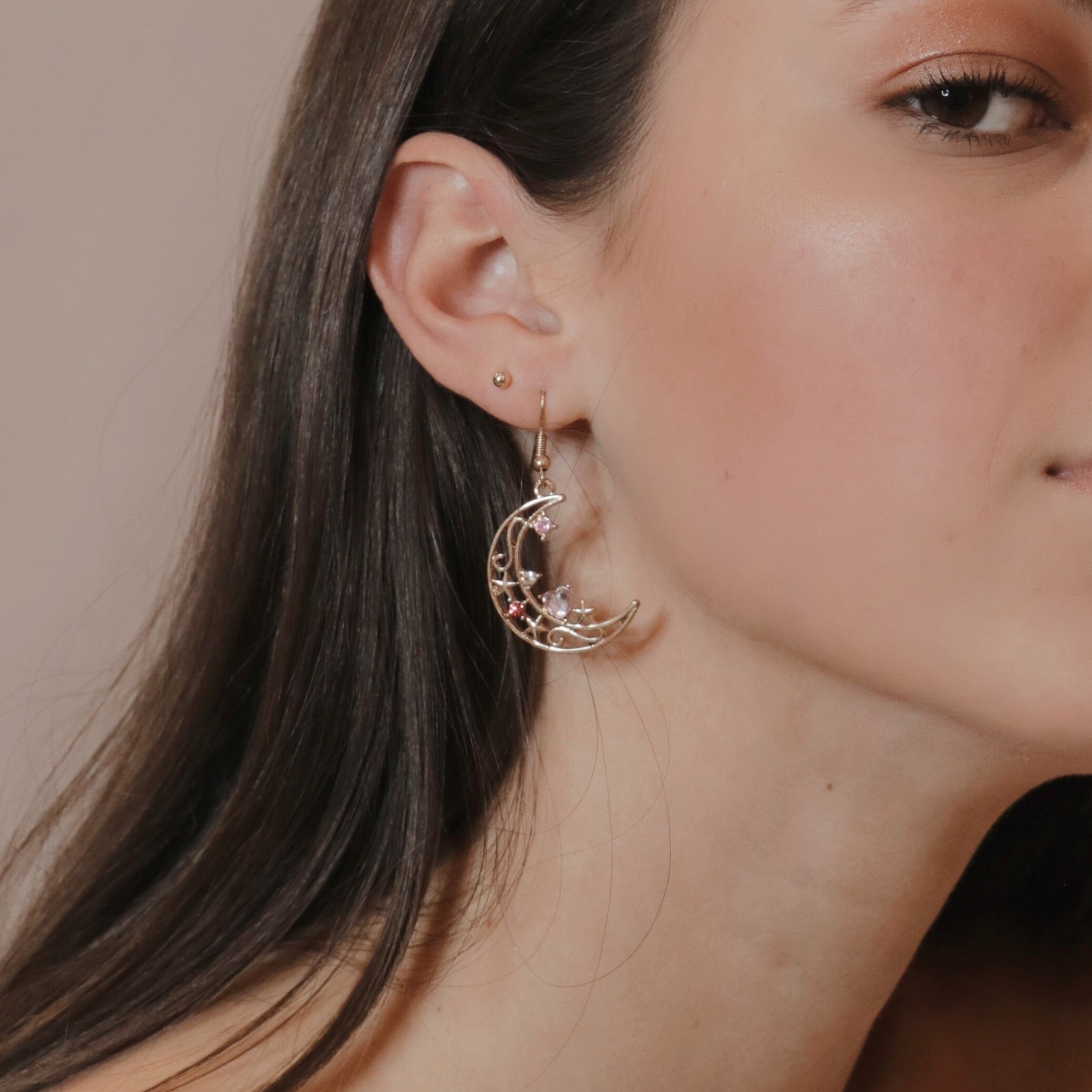 Gold moon earrings with small diamonds