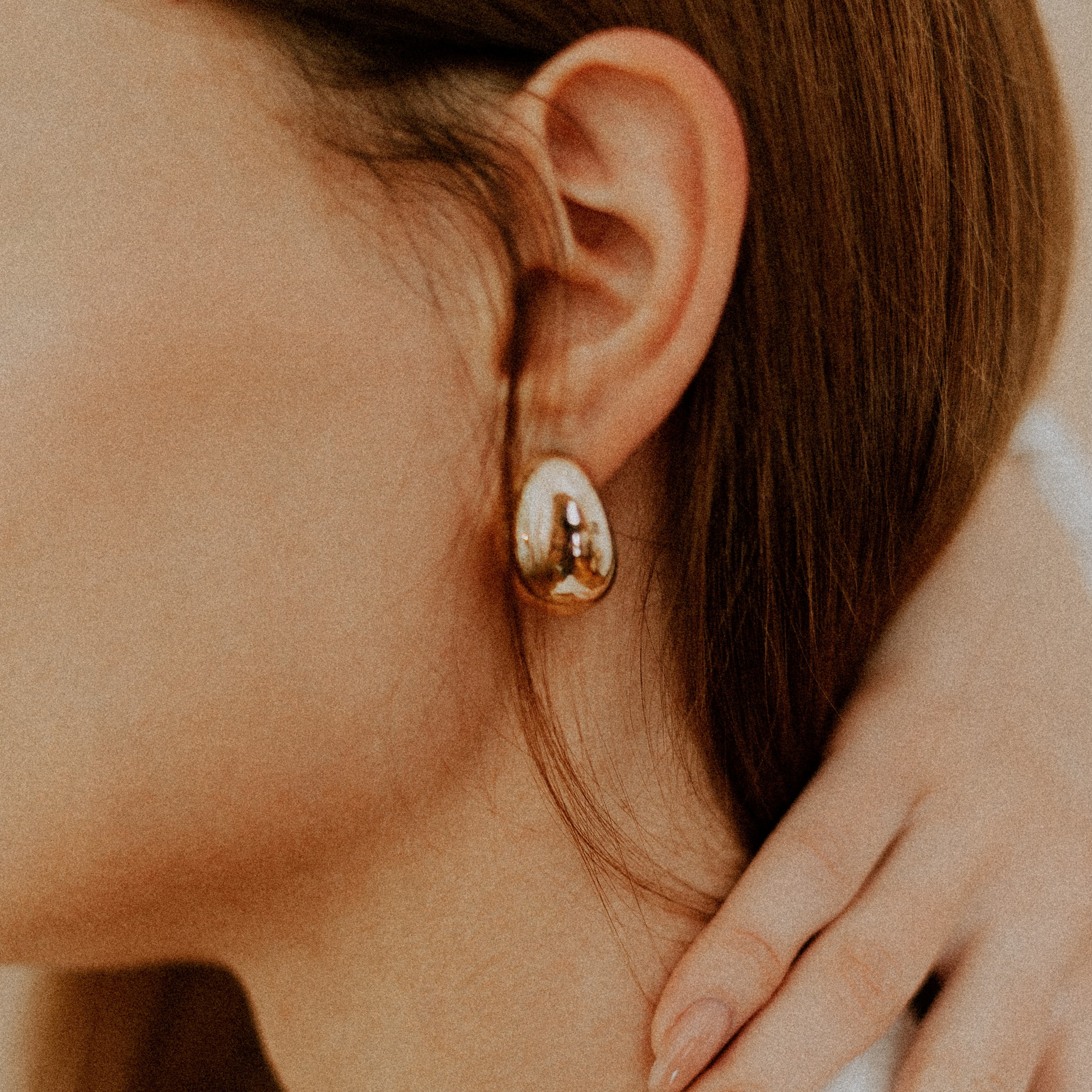 Gold egg-shape earrings