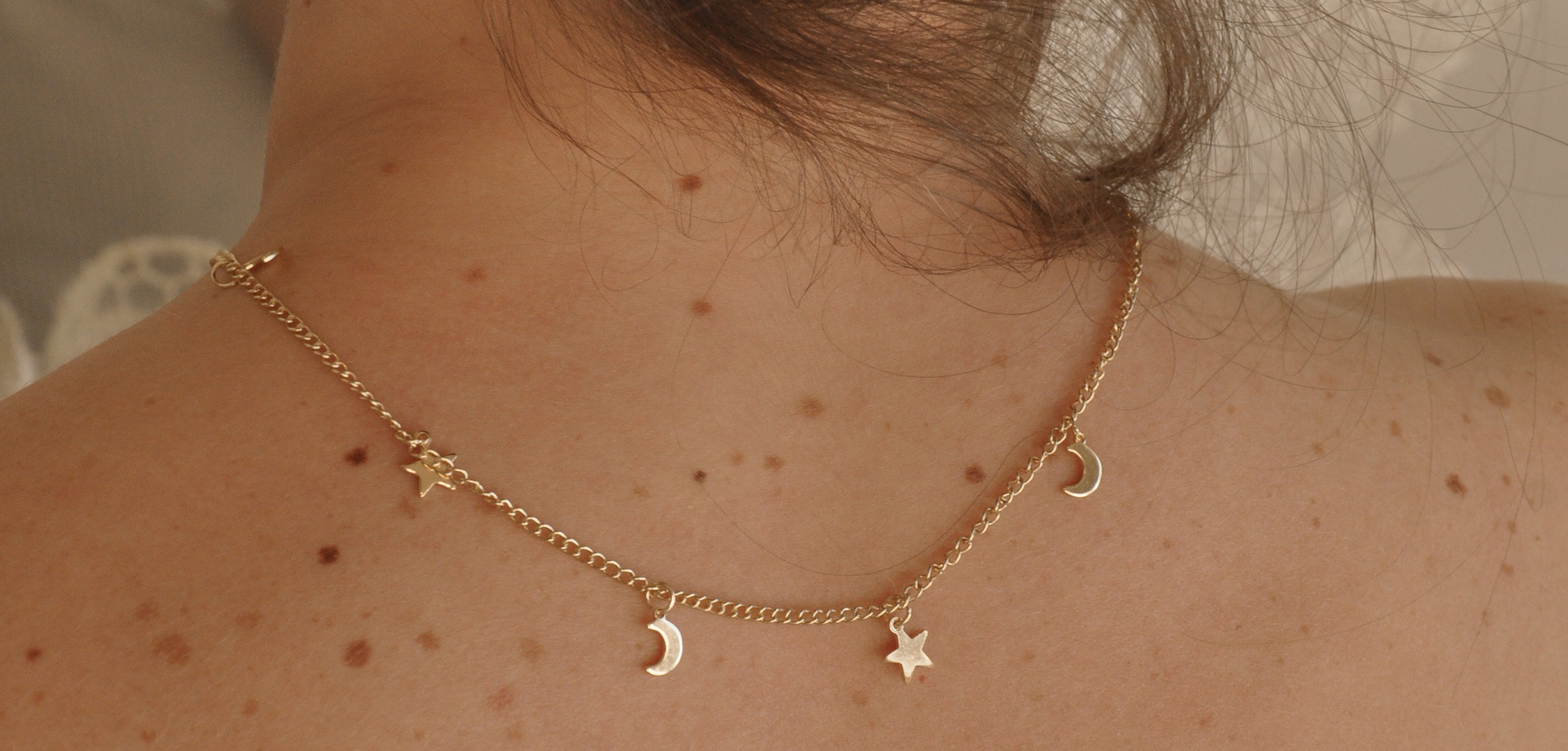 picture of a customer wearing daisy pepper jewelry