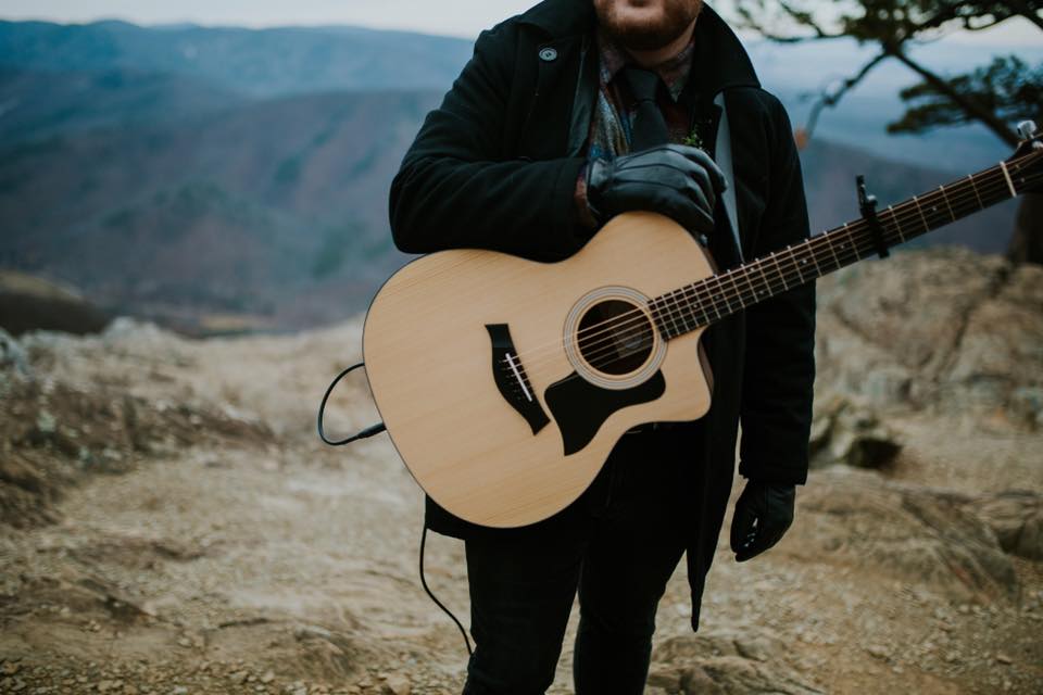 picture of chandler with a guitar